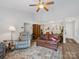 Bright living room with vaulted ceiling, ceiling fan, and open floor plan; warm and inviting for gatherings at 1836 Fairlawn Ct, Rock Hill, SC 29732