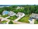 Aerial shot of a neighborhood with well-maintained lawns and tree-lined streets at 18619 Mainsail Ct, Lancaster, SC 29720