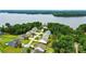 Aerial view of a lakeside community with lush greenery and beautiful waterfront homes at 18619 Mainsail Ct, Lancaster, SC 29720