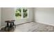 Bright bedroom featuring a large window, natural light, and wood flooring at 18619 Mainsail Ct, Lancaster, SC 29720