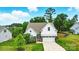 Lovely home with white siding, stone accents, a two-car garage, and a well-kept lawn at 18619 Mainsail Ct, Lancaster, SC 29720