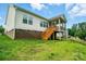 Backyard showcasing the deck and screened in porch at 18619 Mainsail Ct, Lancaster, SC 29720