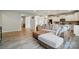Spacious living room features a modern couch, hardwood floors, and access to the kitchen at 18619 Mainsail Ct, Lancaster, SC 29720