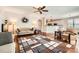 Spacious living room with hardwood floors, neutral tones, and an open layout perfect for entertaining at 18732 Coachmans Trce, Cornelius, NC 28031