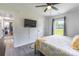 Bedroom with light gray walls, modern decor and an en suite bathroom at 2116 Eastway Dr, Charlotte, NC 28205