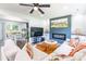 Open floor plan features light gray flooring, modern fireplace, and views into kitchen at 2116 Eastway Dr, Charlotte, NC 28205
