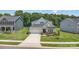Charming single-Gathering home with a two-car garage, manicured lawn, and welcoming front porch at 218 Tetcott St, Mooresville, NC 28115