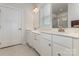 Beautiful main bathroom features dual sinks, white cabinets, and a glass shower with tiled surround at 218 Tetcott St, Mooresville, NC 28115