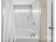 Clean white tub/shower with a showerhead and a window for natural light at 237 River Clay Rd, Fort Mill, SC 29708