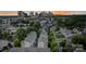 An aerial view of a neighborhood with the city skyline in the background at dusk at 2514 Marshall Pl, Charlotte, NC 28203