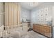 Adorable Bedroom with white crib, neutral decor, decorative prints, and a stylish chandelier at 2514 Marshall Pl, Charlotte, NC 28203