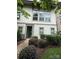 Charming townhouse featuring a professionally landscaped front yard and inviting entry way at 2514 Marshall Pl, Charlotte, NC 28203