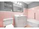 Updated bathroom featuring a vanity, mirror, and tiled shower and tub combo at 3515 Back Creek Church Rd, Charlotte, NC 28213