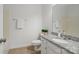 Bathroom with granite counters, ceramic floors, a modern vanity and white cabinets at 3831 Riceland Pl, Charlotte, NC 28216