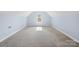Large bonus room with neutral carpet, light blue walls and natural light at 3831 Riceland Pl, Charlotte, NC 28216