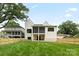 Beautiful backyard featuring a lush lawn, privacy fence, and a view of the home's rear exterior at 408 Ideal Way, Charlotte, NC 28203
