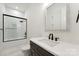 Modern bathroom with a glass-enclosed shower, white subway tile, and sleek fixtures for a clean and spa-like feel at 408 Ideal Way, Charlotte, NC 28203