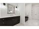 Modern bathroom with sleek vanity, stylish mirror, and a luxurious soaking tub, creating a spa-like retreat at 408 Ideal Way, Charlotte, NC 28203
