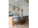 Beautiful kitchen featuring a large island with seating, modern appliances, and stylish lighting fixtures at 408 Ideal Way, Charlotte, NC 28203