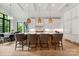 Spacious kitchen with pendant lighting, a large island with seating, and modern appliances at 408 Ideal Way, Charlotte, NC 28203