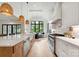 Bright kitchen with large island, modern appliances, pendant lights, and a breakfast nook in view at 408 Ideal Way, Charlotte, NC 28203