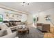Spacious living room with modern furnishings, stylish decor, and an open layout leading to the kitchen at 408 Ideal Way, Charlotte, NC 28203