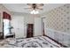 Comfortable bedroom with floral wallpaper, four poster bed, and bright natural light at 409 Ridge Rd, Clover, SC 29710
