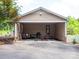 Spacious open garage area with ample storage and a convenient back door entry at 409 Ridge Rd, Clover, SC 29710