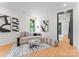 Elegant living room with chic sofa, hardwood floors, and modern artwork on display at 4117 Sarah Dr, Charlotte, NC 28217