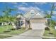 Charming single-Gathering home with stone accents, a two-car garage, and manicured landscaping at 4333 Legacy Dr, Denver, NC 28037