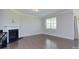 Inviting living room with hardwood floors, a fireplace, and ample natural light at 4333 Legacy Dr, Denver, NC 28037