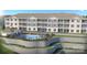 View of the modern apartment complex with a swimming pool and sundeck at 4455 Reed Creek Dr # 202, Sherrills Ford, NC 28673