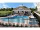 Community swimming pool area offers lounge chairs, tables, and umbrellas at 4455 Reed Creek Dr # 202, Sherrills Ford, NC 28673