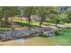 Scenic waterfront area with stone steps leading to the lake and lush greenery, providing a tranquil escape at 4455 Reed Creek Dr # 203, Sherrills Ford, NC 28673