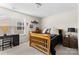 Bedroom featuring a wooden bed frame, desk and dresser at 5059 Fenwick Ct, Lancaster, SC 29720