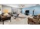Bonus room featuring a large sectional sofa and mounted television at 5059 Fenwick Ct, Lancaster, SC 29720