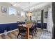 The dining room features wainscoting, multiple windows and a decorative light fixture at 5059 Fenwick Ct, Lancaster, SC 29720