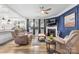 Cozy living room features a fireplace, hardwood floors, and stylish, comfortable seating at 5059 Fenwick Ct, Lancaster, SC 29720