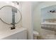 Bright bathroom with modern fixtures, vanity and a shower/tub combination at 5229 Tarrywood Ln, Charlotte, NC 28205