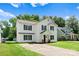 Lovely two-story home with a welcoming front porch and a well-manicured front yard at 5229 Tarrywood Ln, Charlotte, NC 28205
