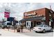Classic brick restaurant with outdoor seating and vintage signage offering a nostalgic dining experience at 5229 Tarrywood Ln, Charlotte, NC 28205