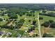 Expansive aerial view of the property and surrounding area featuring lush greenery and trees at 5354 Sherrills Ford Rd, Catawba, NC 28609