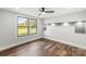Bright bedroom featuring a ceiling fan, natural light, and hardwood flooring at 5354 Sherrills Ford Rd, Catawba, NC 28609