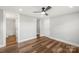 A clean and spacious bedroom has a ceiling fan and hardwood flooring at 5354 Sherrills Ford Rd, Catawba, NC 28609