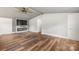 Spacious living room with custom wood flooring and cozy fireplace at 5354 Sherrills Ford Rd, Catawba, NC 28609