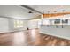 The living room and kitchen area have a large open floor plan with nice wood flooring at 5354 Sherrills Ford Rd, Catawba, NC 28609