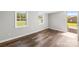 Room featuring two windows and hardwood flooring at 5354 Sherrills Ford Rd, Catawba, NC 28609