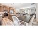 A kitchen open to the dining and living room, featuring stainless steel appliances and butcher block countertops at 5720 Enochville School Rd, Kannapolis, NC 28081