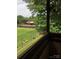 View from the deck overlooks a spacious, fenced backyard with lush greenery at 5727 Dockside Dr, Charlotte, NC 28227