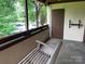 Cozy deck with a swing, offering a relaxing outdoor space at 5727 Dockside Dr, Charlotte, NC 28227